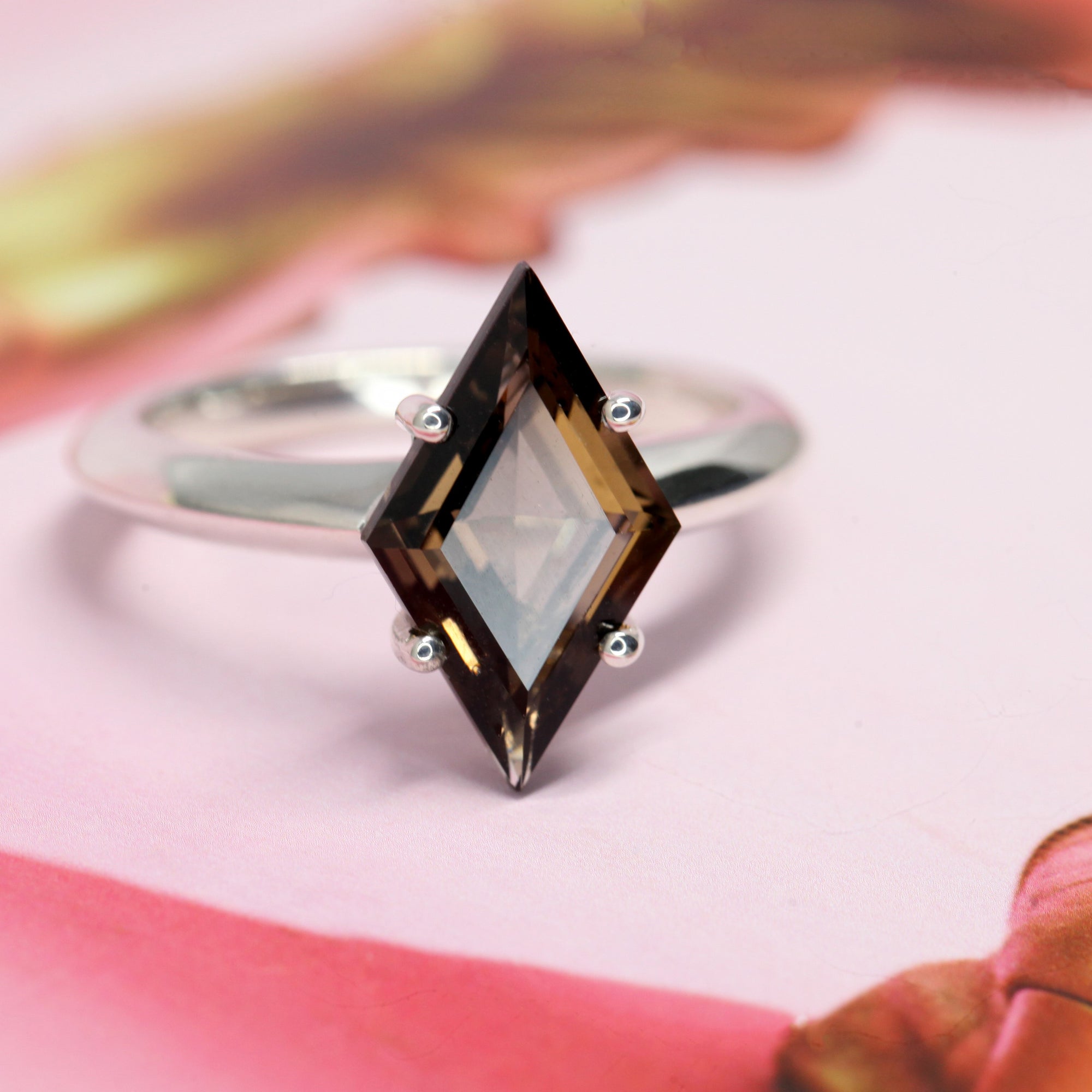 Front view of smoky quartz silver cocktail ring bena jewelry montreal color gemstone bold ring light brown lozenge fancy shape gemstone montreal made in canada fine jewelry silver ring bridal custom specialist montreal little italy jeweler