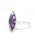 Side view of edgy cocktail ring marquise shape bold cockail ring bena jewelry edgy collection natural purple gemstone custom ring specialist montreal little italy jeweler