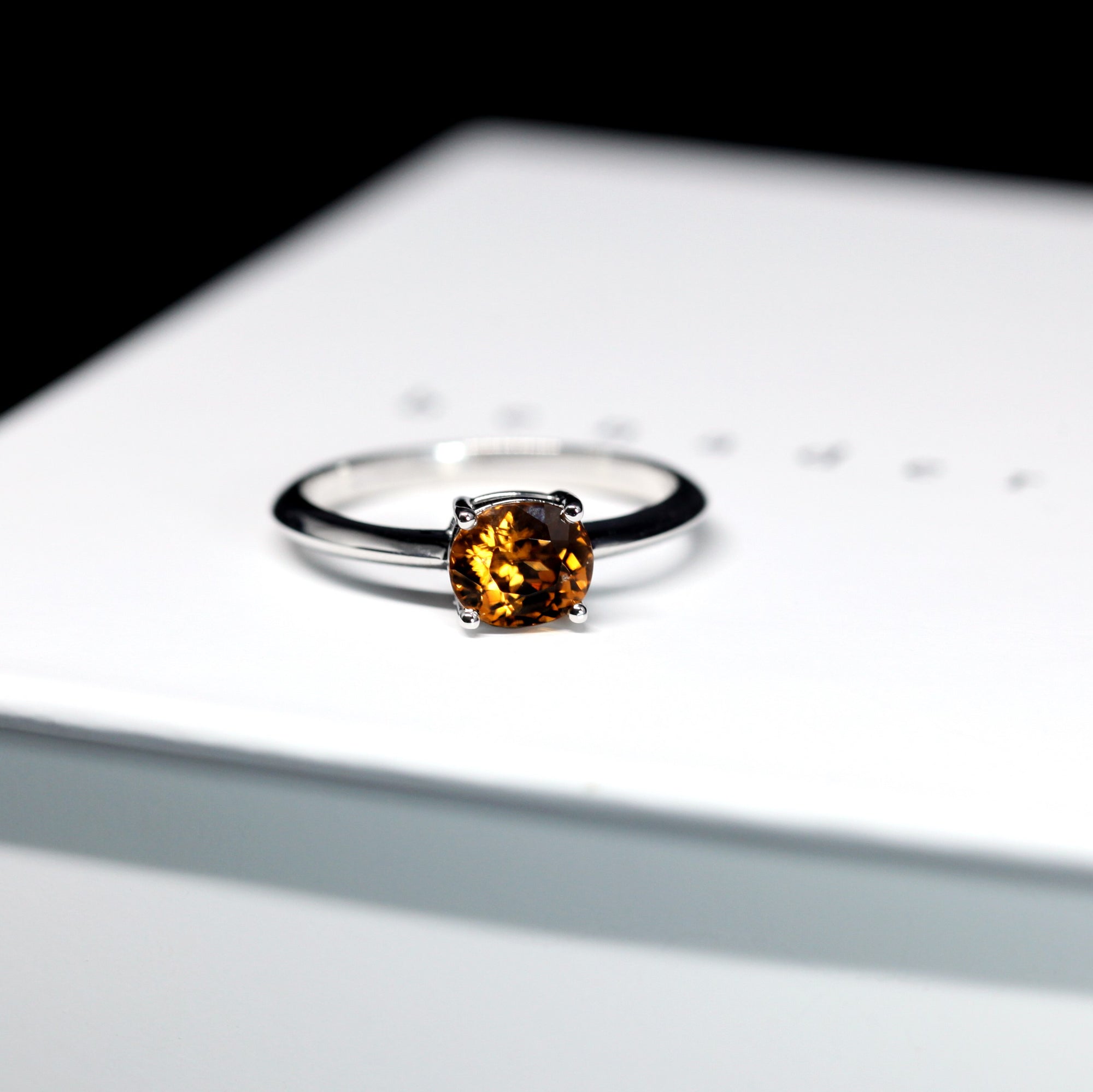 top view of natural zircon engagement ring color gemstone bridal jewelry montreal handmade in little italy color gemstone bridal jewelry locla jewelry studio montreal bena jewelry custom bridal color gemstone jewelry