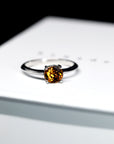 top view of natural zircon engagement ring color gemstone bridal jewelry montreal handmade in little italy color gemstone bridal jewelry locla jewelry studio montreal bena jewelry custom bridal color gemstone jewelry