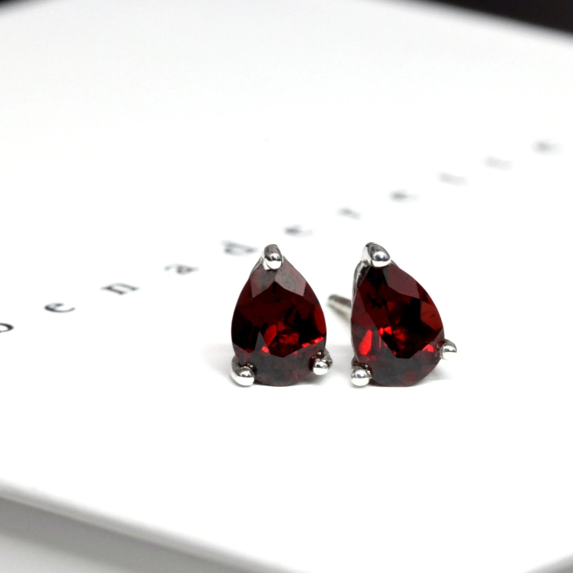 Gemstone stud earrings sterling silver pear cut pyrope garnet bena jewelry montreal custom made color gemstone fine jewelry silver minimalist garnet gemstone jewelry minimalist pear red gemstone garnet earrings