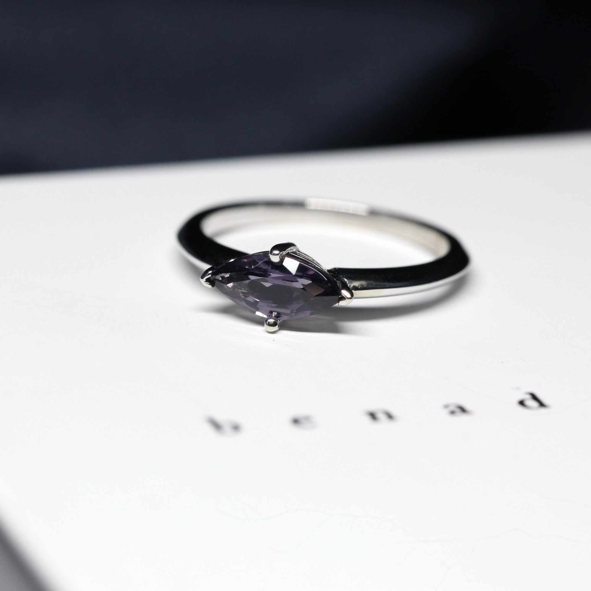 Side view of edgy marquise shape spinel gemstone montreal made in canada fine jewelry custom white gold engagement ring bena jewelry montreal designer fine jewelry color gemstone specialist