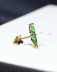 Tsavorite garnet gemstone pear cut stud earrings 18 kt yellow gold