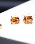 bena jewelry oval shape orange gemstone garnet natural vivid orange color yellow gold gemstone stud handamde in montreal minimalist unisex fine color gemstone jewelry montreal handmade in canada litte italy jewelry designer