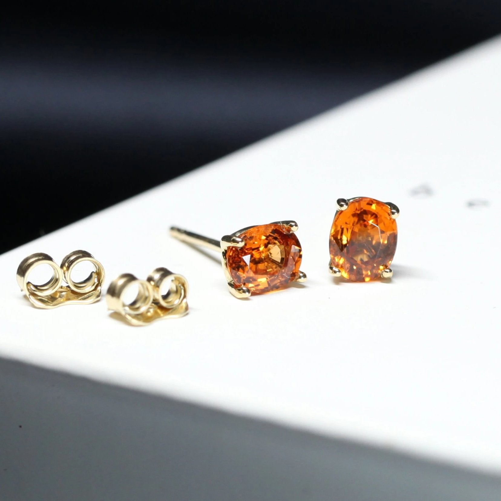 natural orange gemstone stud earrings garnet jewelry spessartite gemstone oval shape garnet earrings color gemstone jewelry bridal earrings yellow gold earrings bena jewelry litte italy jeweler montreal made in canada fine jewelry designer custom made color gemstome specialist