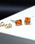 natural orange gemstone stud earrings garnet jewelry spessartite gemstone oval shape garnet earrings color gemstone jewelry bridal earrings yellow gold earrings bena jewelry litte italy jeweler montreal made in canada fine jewelry designer custom made color gemstome specialist
