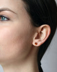 girl wearing bena jewelry garnet jewelry color gemstone stud earrings natural orange color gemstone bridal color gemstone jewelry