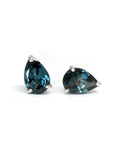 Front view of topaz gemstone stud earrings pear shap color gemstone minimalist jewelry night blue gemstone drop shape custom made color gems specialist montreal handmade in canada bena jewerlry