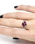 girl wearing toi et moi marquise shape rhodolite garnet white gold ring bena jewelry montreal custom bridal color gemstone ring