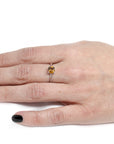 girl wearing orange color zircon natural gemstone engagement ring montreal handmade in canada little italy montreal jeweler custom made color gemstone engagement ring local ethical jewelry studio bena jewelry montreal