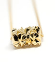 Front view of edgy chiseled pendant montreal made in canada vermeil gold silver plated fine jewelry montreal made