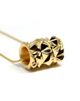 White background of vermeil gold silver plated yellow gold tube pendant bena jewelry designer montreal fine jewelry montreal made in canada