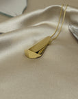 Front view of vermeil gold plated silver jewelry modern minimalist jewelry design Little Italy Jeweler Montreal Made in Canada
