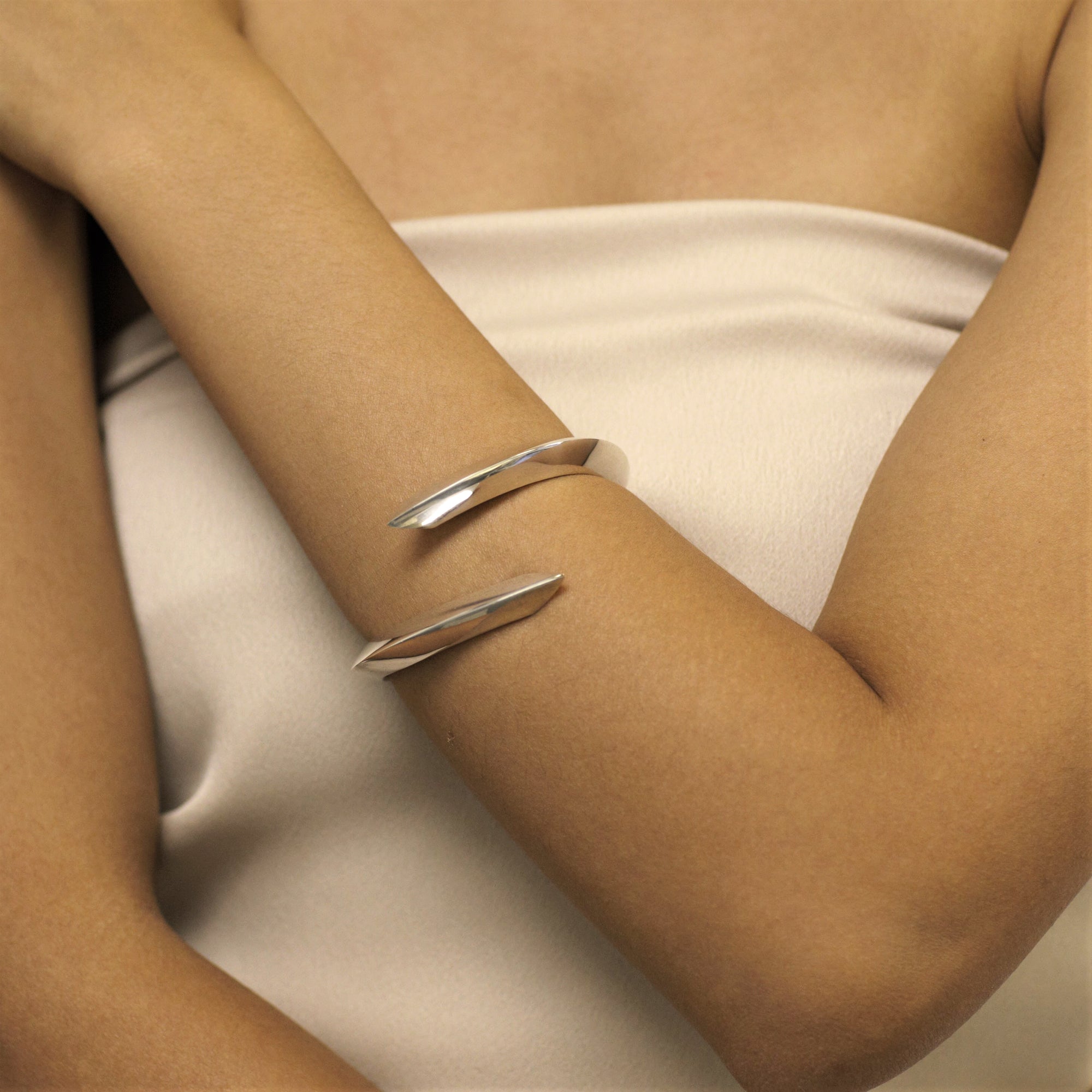 Woman wearing statement bracelet silver jewelry bracelet