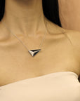 Girl wearing statement sterling silver pendant