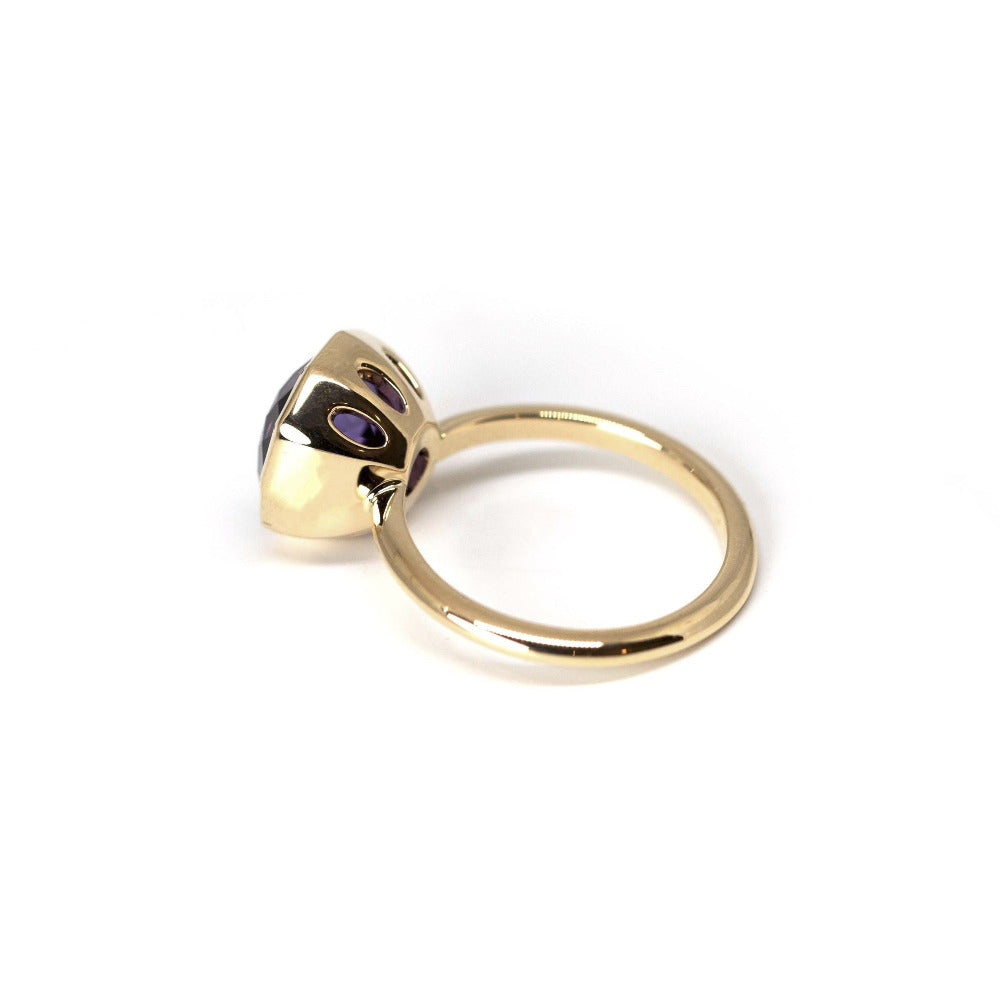 Yellow gold statement ring with a round Brazilian amethyst, part of the Fancy Edgy collection, handcrafted à Montreal by Bena Jewelry.