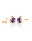 Amethyst & Pink Studs Earrings, demonstrating their elegant proportions and striking gemstone combination.