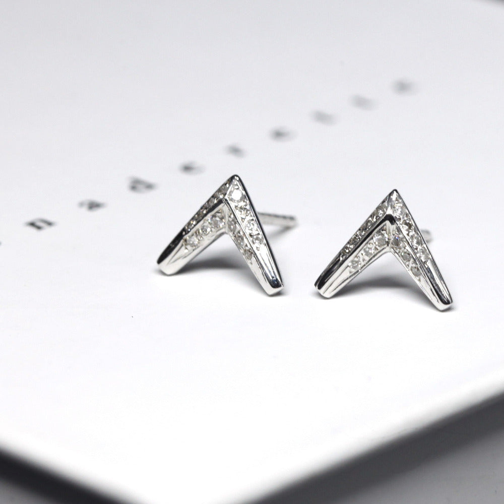 White gold and diamond earrings arrow shape Bena Jewelry fine jewelry made in Montreal Canada