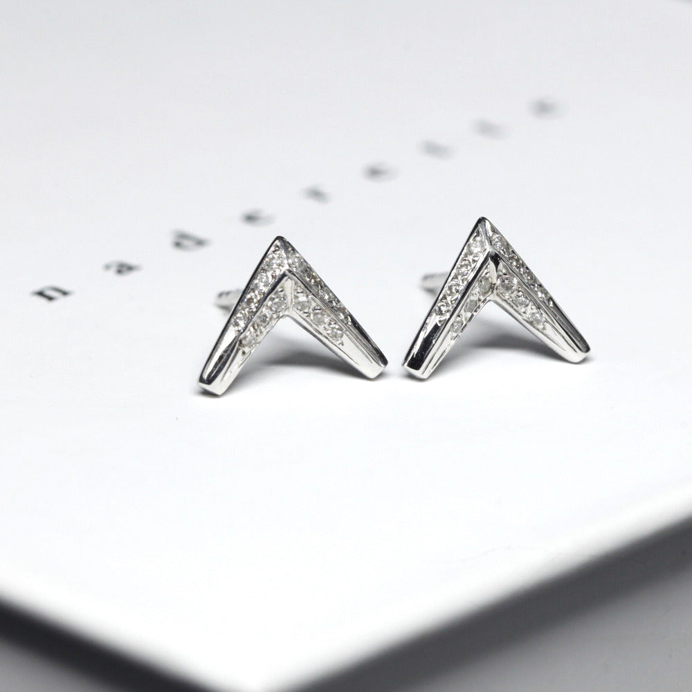 White gold round diamond earrings arrow shape Bena Jewelry fine jewelry made in Montreal Canada