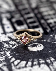 Front view: Displays the seamless construction of the yellow gold band and the secure setting for the Asscher-cut zircon. Made by Bena Jewelry in Montreal, Canada.
