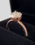 side view of rose gold diamond engagement ring montreal bena jewelry custom bridal jewelry designer handamde rose gold diamond ring small diamond halo diamond jewelry made in montreal