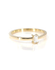 Boxy Baguette Ring in yellow gold featuring a baguette-cut diamond by Bena Jewelry photographed on a clean white background custom-made in Montreal