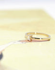 side view of edgy boxe wedding band custom made in montreal by bena jewelry designer canada best jeweler ruby mardi on yellow background