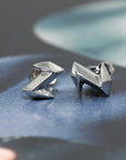Front view of white gold Electric stud earrings made by the designer from Canada, Bena Jewelry.