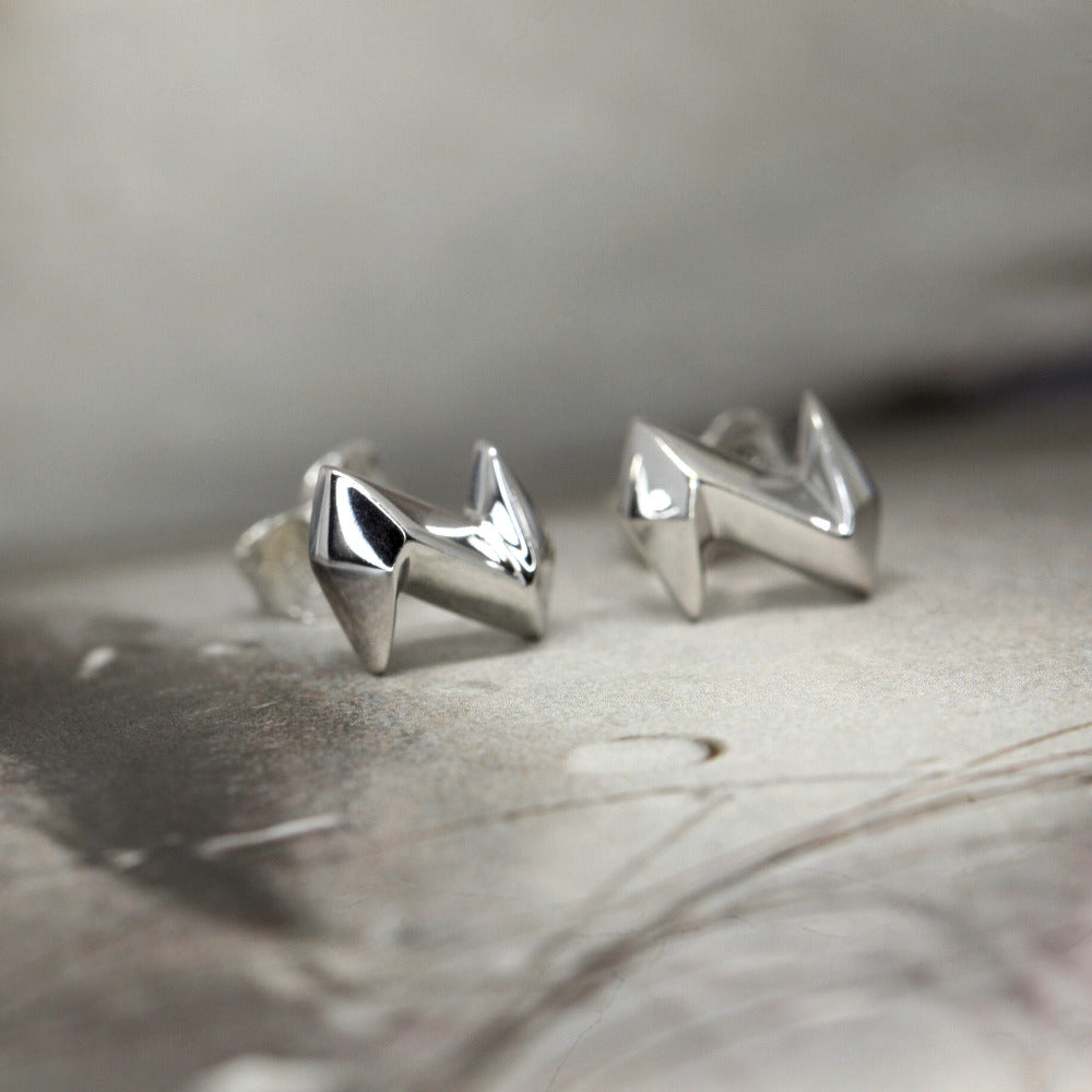 Unisex fine jewelry, white gold studs with an edgy style, made and crafted in Canada.