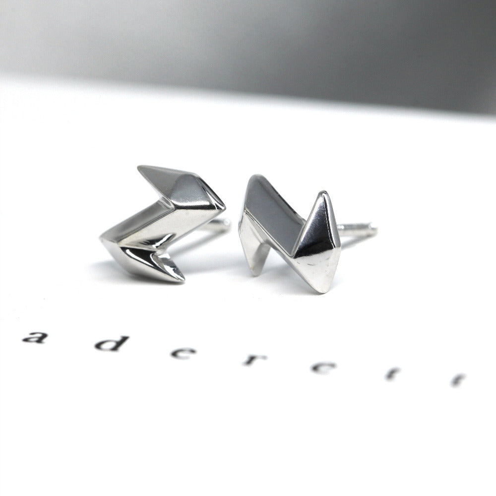 White gold edgy Electric studs earrings, made in Montreal by Bena Jewelry.