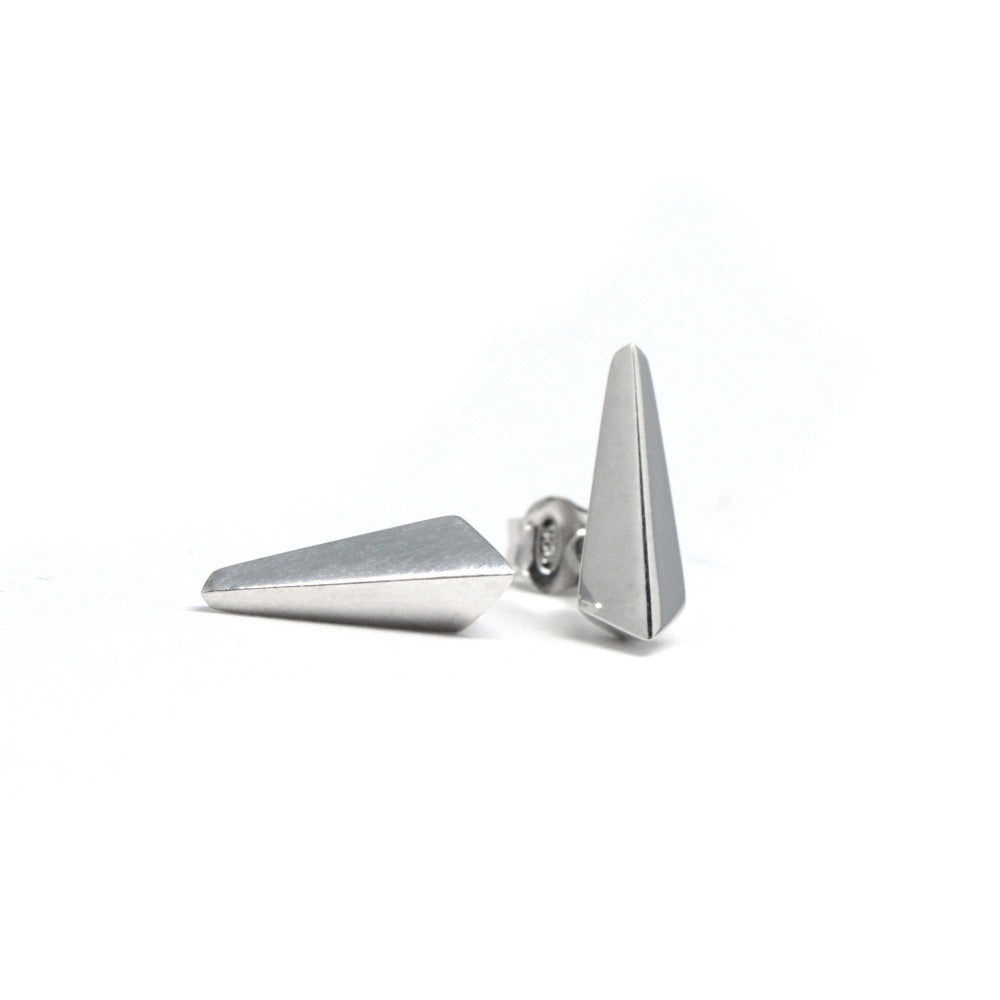 White Background: "Blade stud earrings in white gold by Bena Jewelry, featured on a minimalist white background. These modern and edgy unisex earrings, designed in Montreal, emphasize clean lines and geometric elegance. Handmade in Canada.