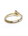 Back view of a yellow gold Kink Baguette Chocolat Diamond Ring with a baguette-cut brown diamond crafted by Bena Jewelry photographed on a white background bespoke jewelry from Montreal.