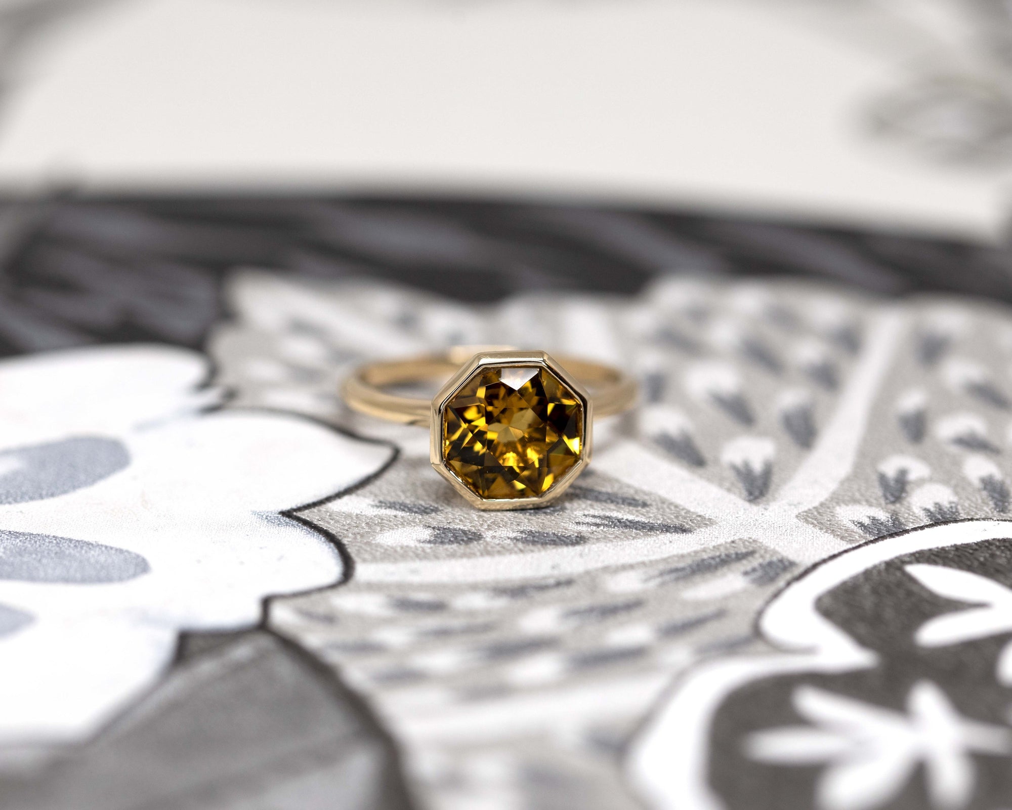 Hexagonal Fireball Citrine ring worn on hand – A statement cocktail ring showcasing a vivid yellow-orange citrine, designed for bold jewelry lovers. Crafted by Bena Jewelry in Montreal.