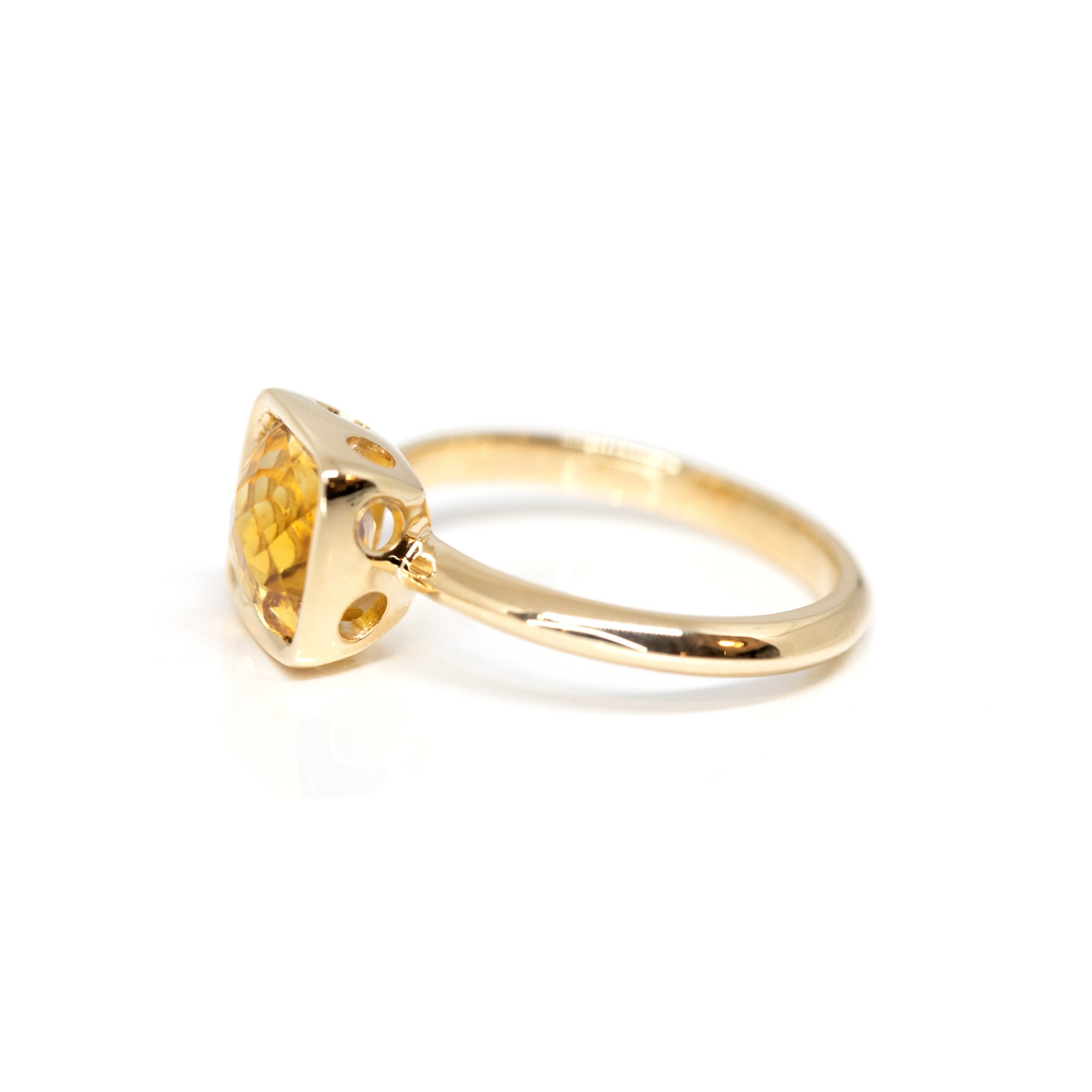 The Bezel Set Citrine cocktail ring, demonstrating its modern yet timeless elegance, designed by Bena Jewelry in Montreal, Canada.