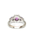 back view of platinum custom made ring pink sapphire and purple trillopn gemstone bespoke edgy design on a white background