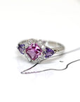side view of square pink sapphire purple trillon gems and diamond custom made in montreal at the best jeweler ruby mardi by the designer bena jewelry on white background