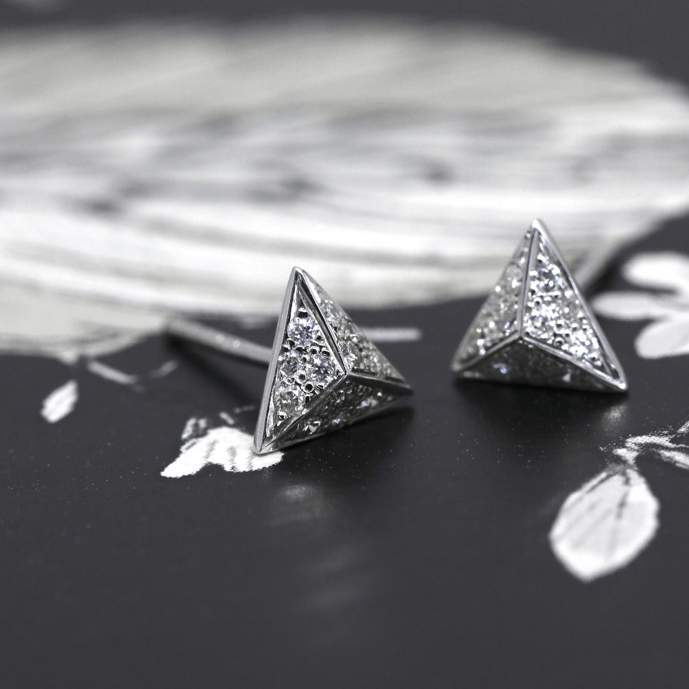 Side view of Delta White Gold and Diamond stud earrings, from the Fancy Edgy Collection, by Bena Jewelry Montreal Fine Jewelry.