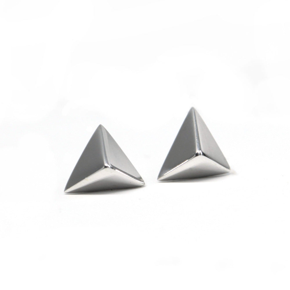 Delta Gold Studs in white gold by Bena Jewelry, showcasing a sleek pyramid design, photographed on a clean white background, fine unisex jewelry made in Montreal.