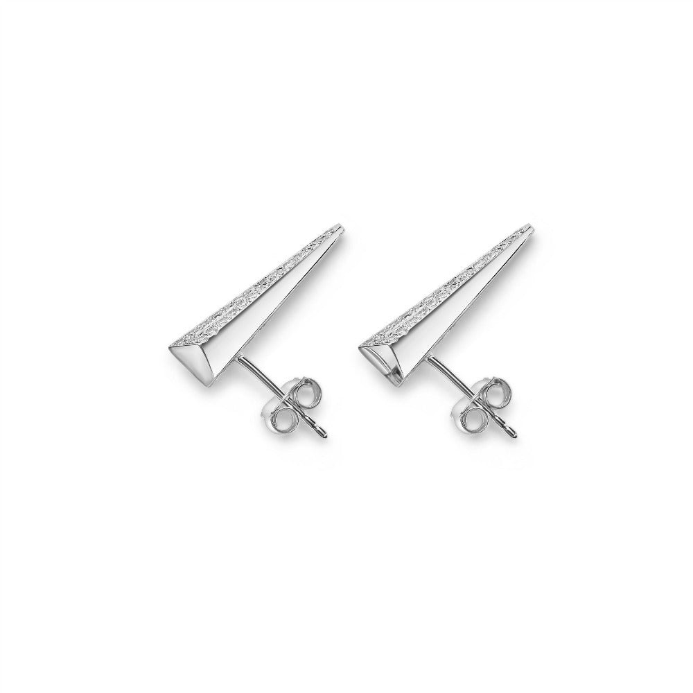 Top-down view of diamond earrings – A perfect balance between fine jewelry and avant-garde design, crafted with natural diamonds.