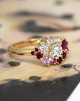 Displays the cohesive arrangement of gemstones, blending modern shapes with traditional craftsmanship. Designed in Montreal by Bena Jewelry.