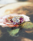 A closer look at the diamond’s brilliance and the bold red rubies, framed by a sleek yellow gold band. Custom design by Bena Jewelry, Montreal, Canada.