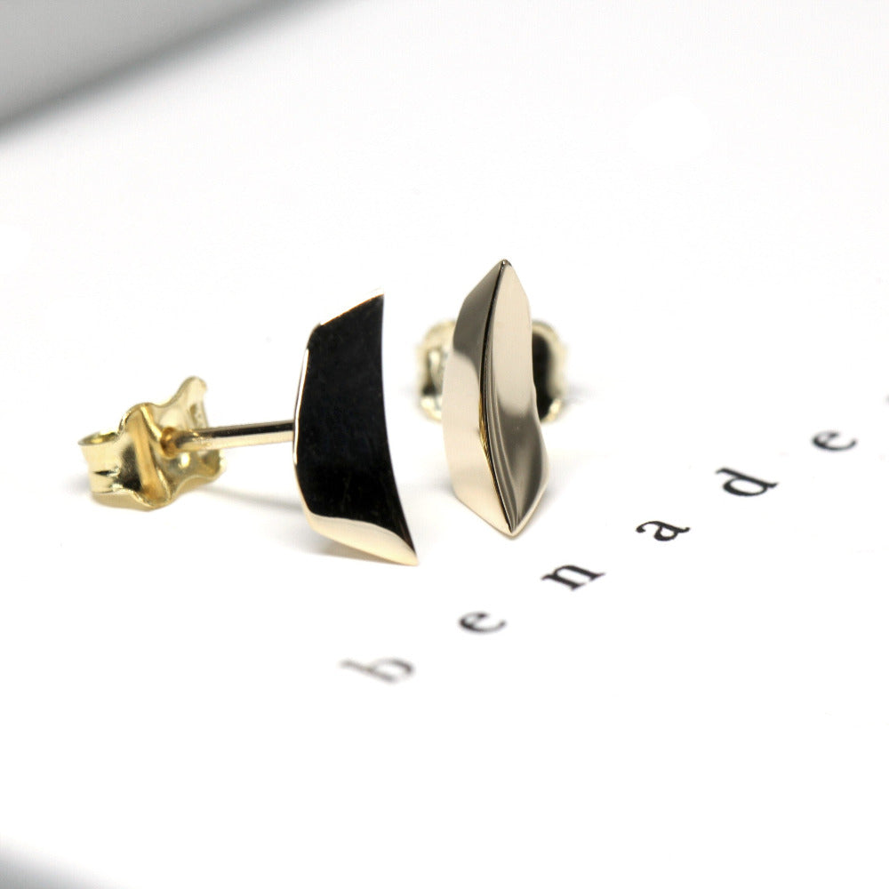 Contemporary yellow gold earrings designed with clean lines and edgy details, perfect for everyday wear. Made by Bena Jewelry, edgy design.