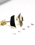 Contemporary yellow gold earrings designed with clean lines and edgy details, perfect for everyday wear. Made by Bena Jewelry, edgy design.