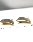 Sleek and sharp yellow gold earrings featuring an edgy design, crafted in Montreal by a fine jewelry designer.