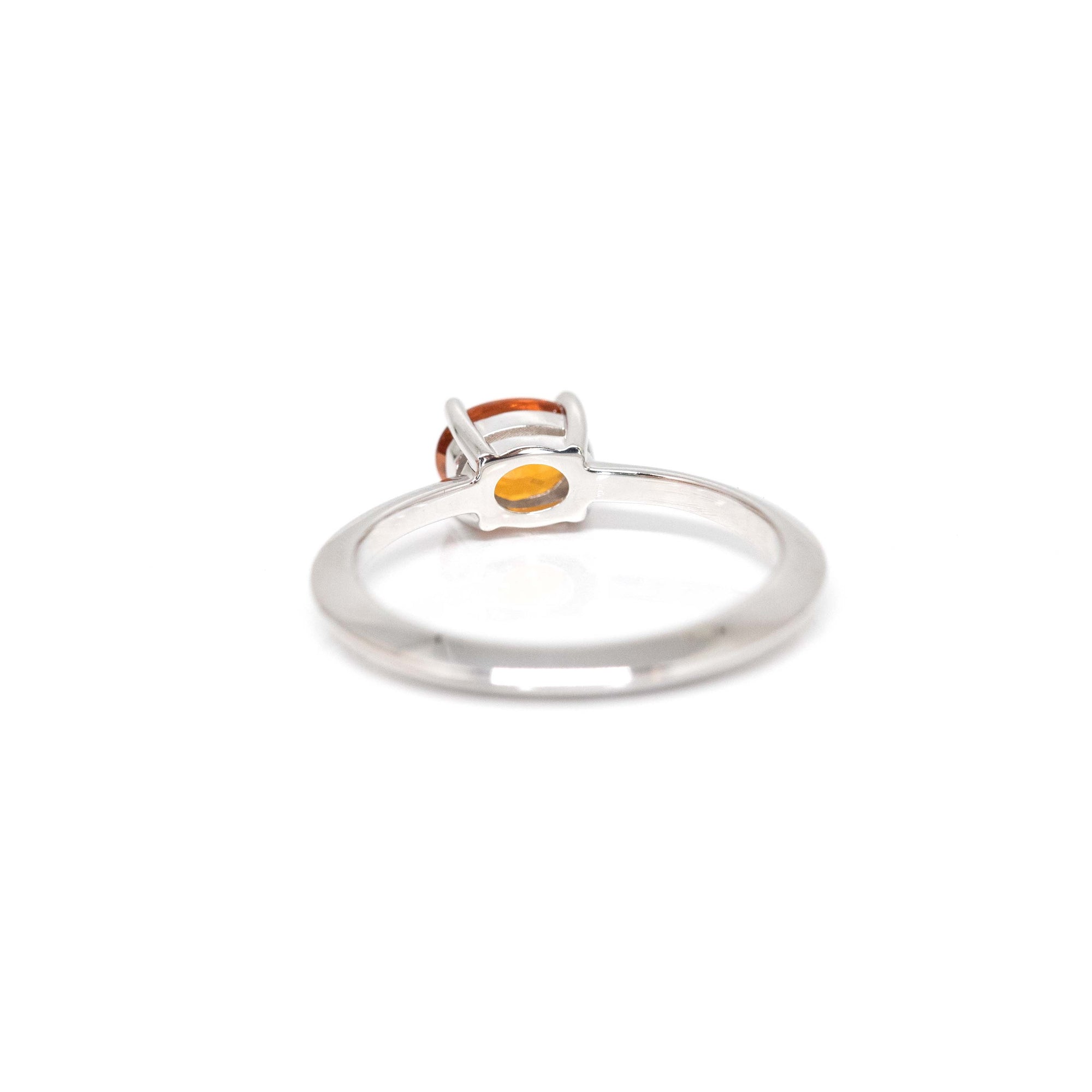 back view of minimalist white gold garnet ring