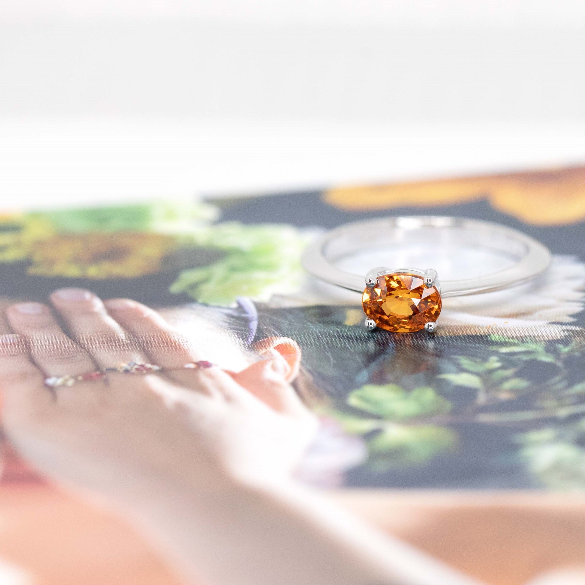 white gold orange garnet engagement ring custom made in montreal by bena jewelry