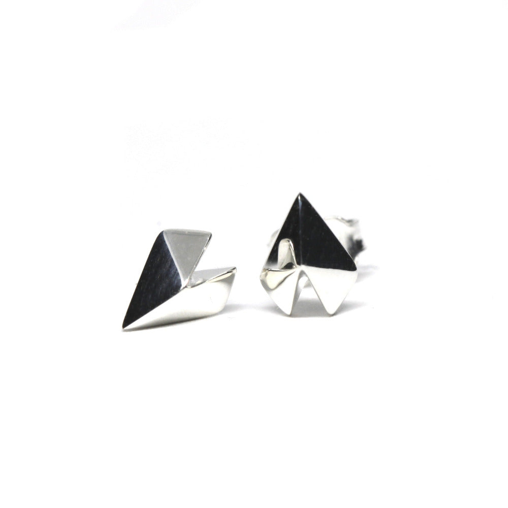 White gold Edgy Gold Heart Studs by Bena Jewelry displayed on a clean white background modern unisex earrings custom-crafted in Canada