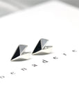 White gold Edgy Gold Heart Studs by Bena Jewelry, displayed on a light-colored background, bold heart-shaped design, handmade fine jewelry from Canada.