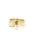 Wide yellow gold band with a sophisticated emerald-cut diamond centerpiece. A bold and modern design by Montreal-based Bena Jewelry.