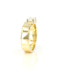 Luxurious yellow gold ring with an emerald-cut diamond and bold design. A statement engagement ring by Bena Jewelry, handcrafted in Montreal.